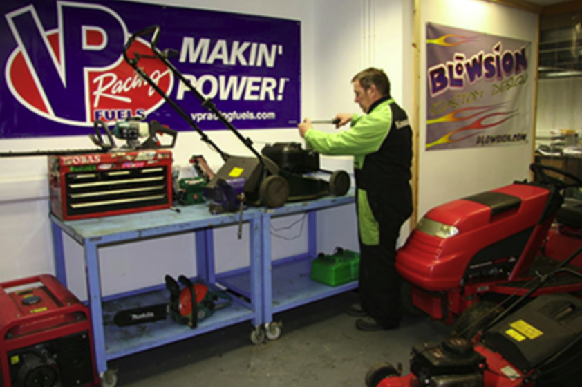 Lawn mower repair workshop bench at Cirencester Garden Machinery